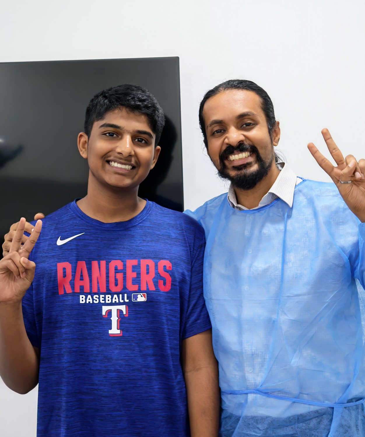 Dr. Keerthan with a young patient