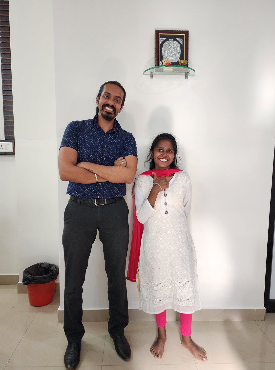Dr. Keerthan with a young patient
