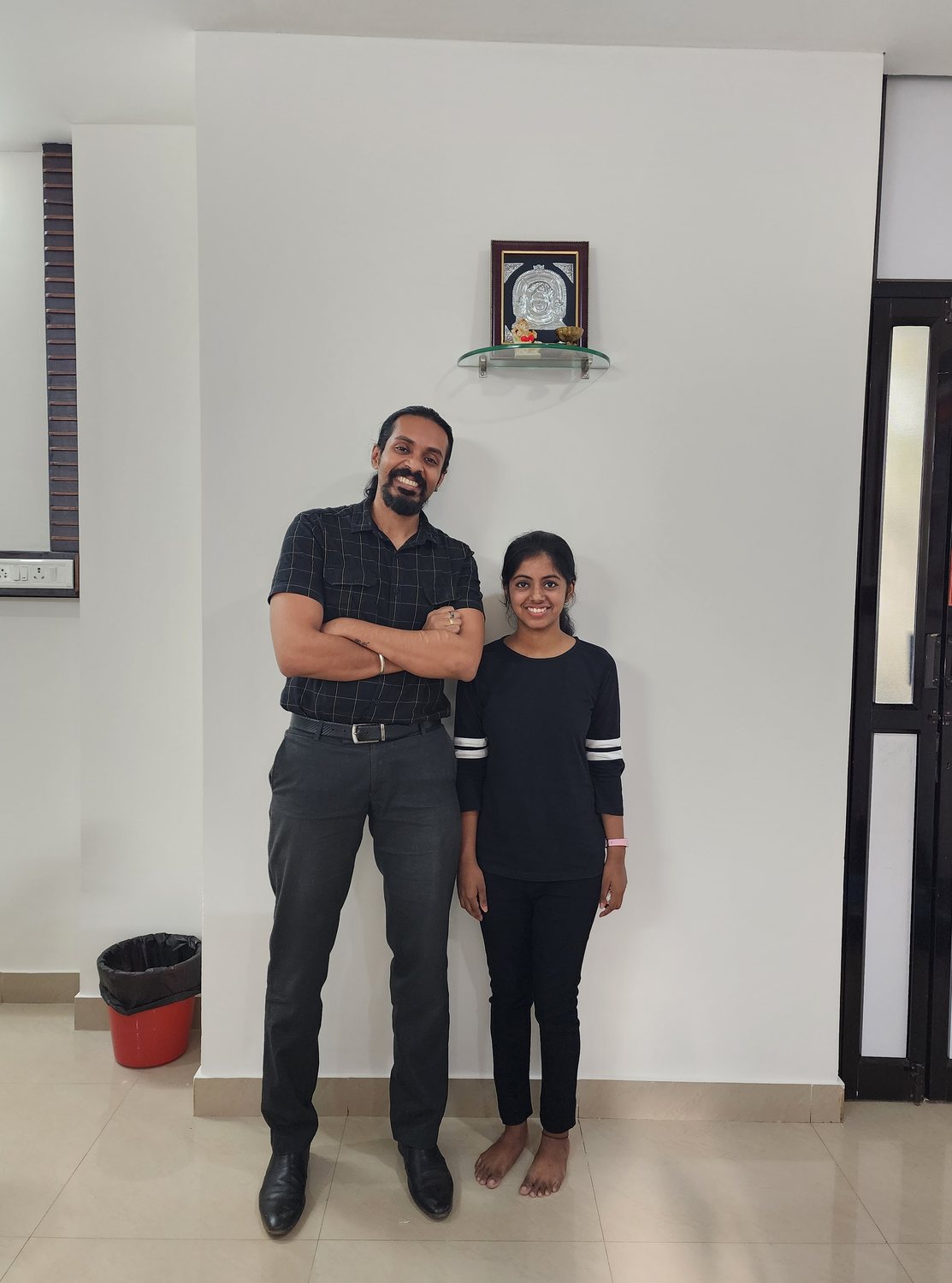 Dr. Keerthan with a young patient