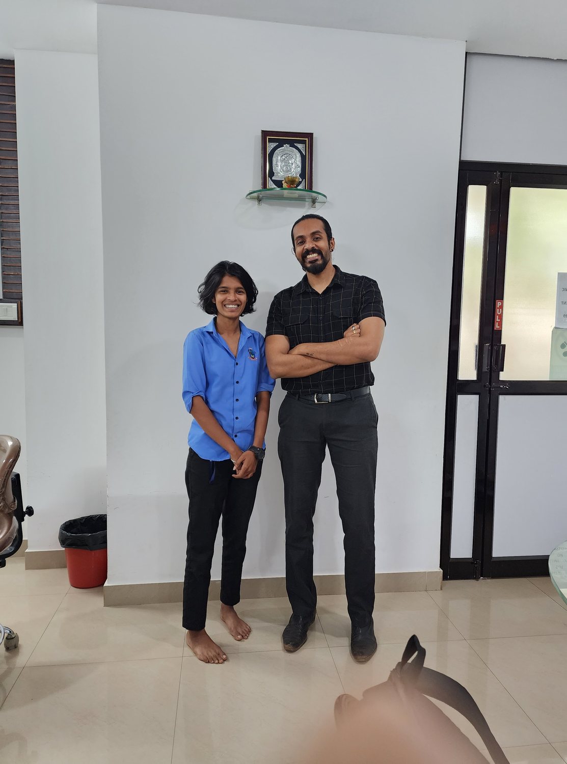 Dr. Keerthan with a patient