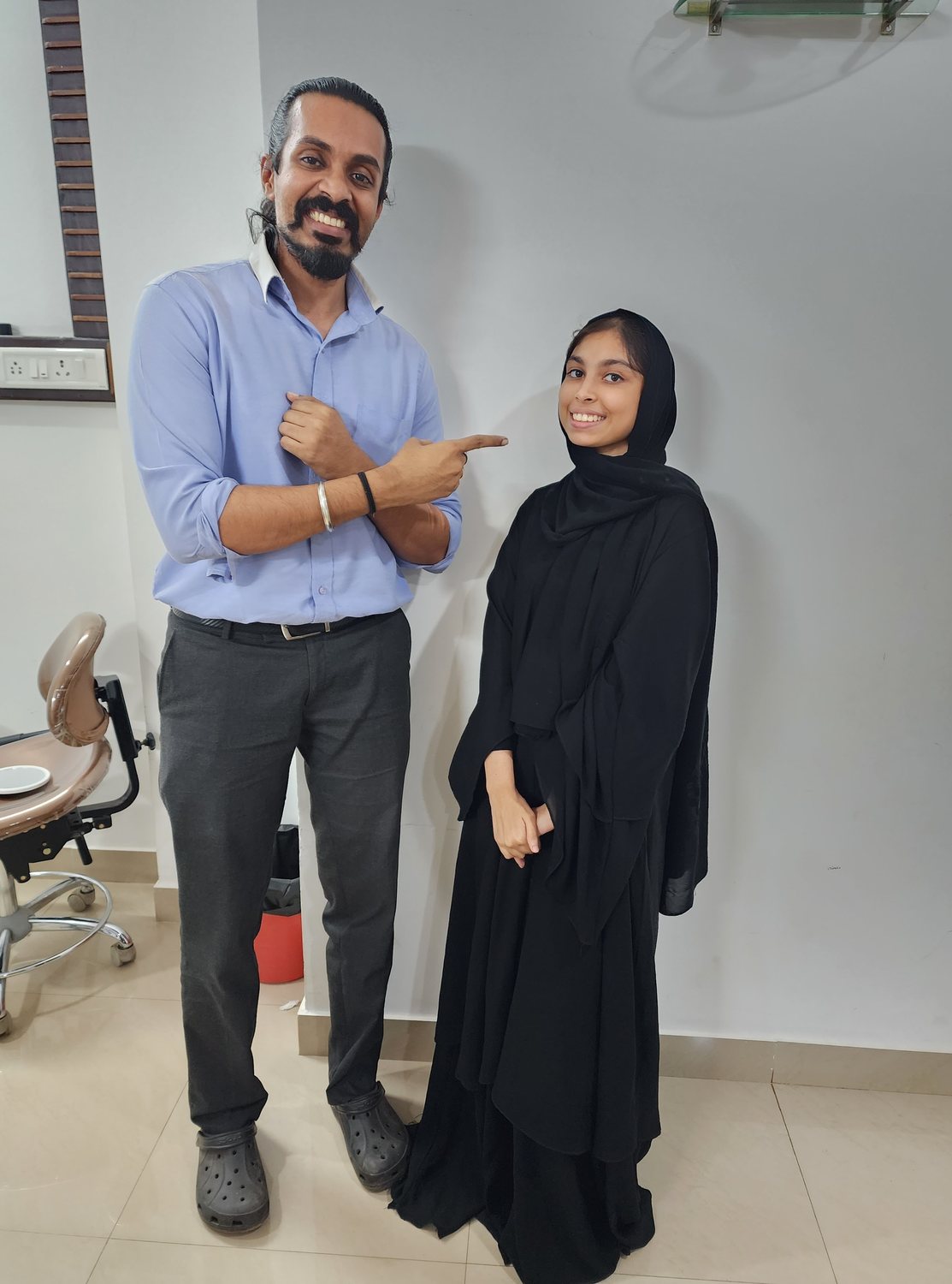 Dr. Keerthan with a patient
