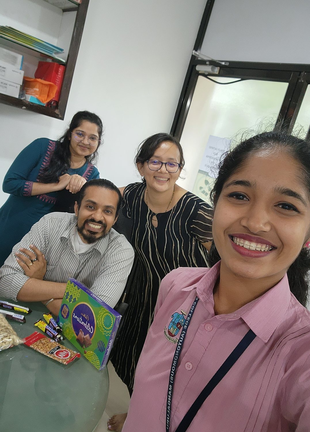 Dr. Keerthan with colleagues, group selfie